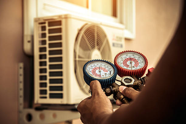 Professional Air Conditioning Service technician working in Camp Sherman, OR